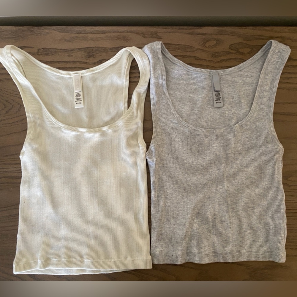 White and Gray Tank Tops